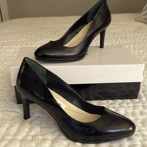 Never worn Alfani black faux leather heels.